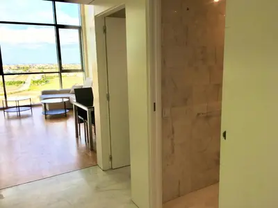 a room with a door leading to a living room at Panoramic Suites II By VALENCIAFLATS EU in Valencia