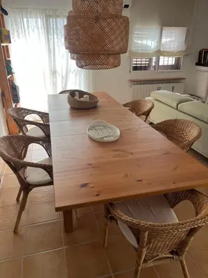 a wooden dining room table with wicker chairs at Villa 20min Valencia - Playas in San Antonio de Banageber