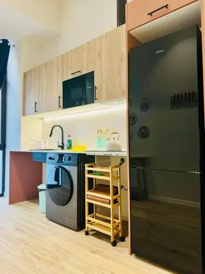 a kitchen with a sink and a washing machine at Modern Apartment with Style near Center in Valencia