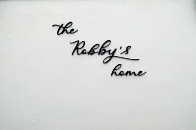 a sign that reads the rockleys home at The Robby's home in Valencia