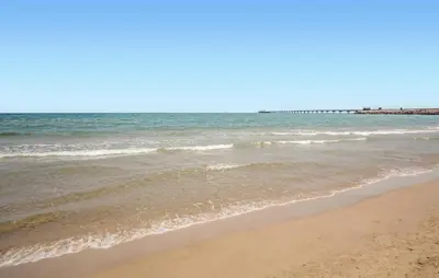 a view of the ocean from the beach at Beach Front Apartment In Sagunto in Sagunto