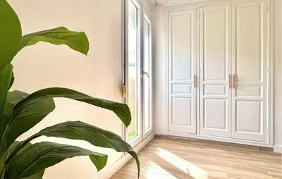 a room with a plant and a door at Beach Front Apartment In Sagunto in Sagunto