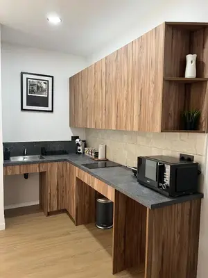 a kitchen with a counter top with a microwave at Turia Loft Valencia in Valencia