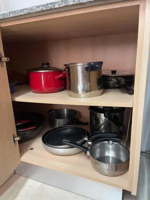 a drawer with scissors and other kitchen utensils at Acogedor piso en Benissanó in Benisanó