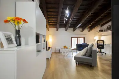 a living room with a couch and a table at SingularStays San Vicente in Valencia