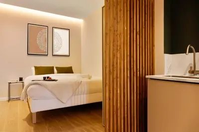 a hotel room with a bed and a sink at SariStays Valencia Modern & O in Valencia