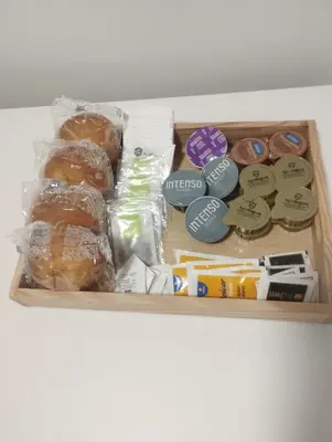 a drawer filled with different types of donuts and other food at TODO INCLUIDO - Wifi,playa,piscina 24h,garaje,terraza y Mercadona -MUY CÓMODO in Canet de Berenguer