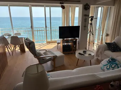 a living room with a view of the ocean at Fantásticas vistas al mar en el Faro in Faro de Cullera