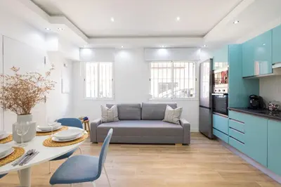 a living room with a couch and a table at GuestReady - Inviting Valencia retreat in Valencia