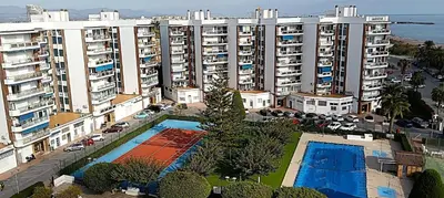 an overhead view of a large apartment building with a pool at ESPECIAL FALLAS 25 MINUTOS VALENCIA PLAYA in Puerto de Sagunto