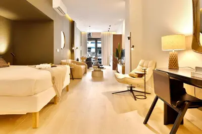 a hotel room with a bed and a piano at SariStays Valencia City Center R in Valencia