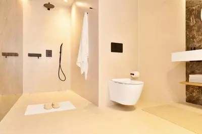 a white bathroom with a toilet and a shower at SariStays Valencia City Center R in Valencia