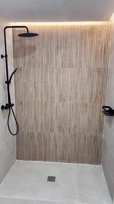 a shower with a glass door in a bathroom at Apartamento Boutique Valencia 4-Pax - C-3 in Valencia