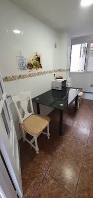 a room with a desk and a chair and a window at Habitaciones en Apartamento Port Sagunto in Puerto de Sagunto