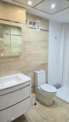 a bathroom with a toilet and a sink and a tub at BEACH VALENCIA LUXURY A36-22 Apartment with terrace and sea views in Valencia