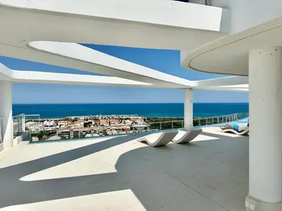 a balcony with a view of the ocean at Luxury Canet in Canet de Berenguer