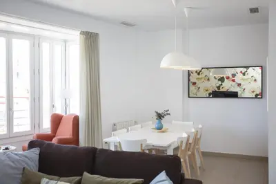 a living room with a couch and a table at SingularStays Mar44 Terrace in Valencia