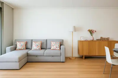 a living room with a couch and a table at Valencia Beach Home 21 in Valencia