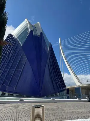 a large blue building with a bridge in the background at Escapate con estilo en Valencia in Valencia