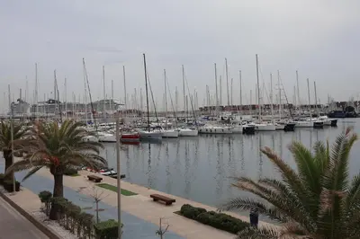 a marina with alot of boats in the water at Magnificent sailboat with free parking for cars in Valencia