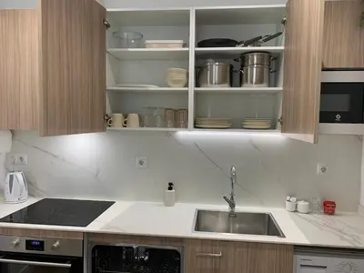 a kitchen with a sink and a counter top at Nieuw Appartement in El Carmen in Valencia