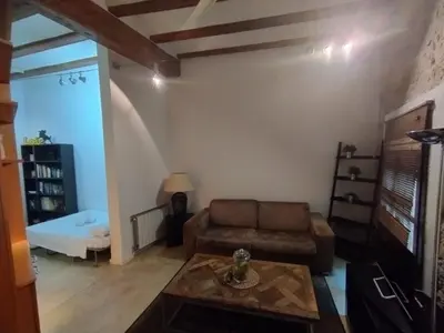 a living room with a couch and a coffee table at Cozy apartment in the old town - San Ramon in Valencia