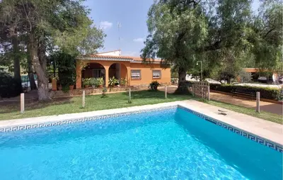 a swimming pool in front of a house at Awesome Home In Bétera in Bétera