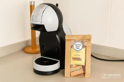a black and white mixer next to a box at Valencia Beach Home 8 in Valencia