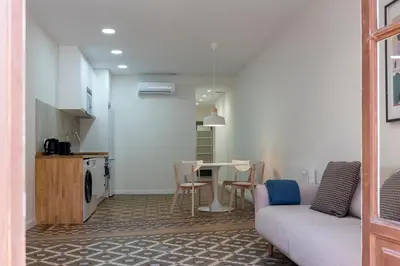 a living room with a couch and a table at Quart Historic Stay 2 in Valencia