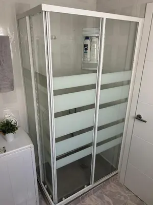 a shower with a glass door in a bathroom at Apartamento Bahía Cullera II in Cullera