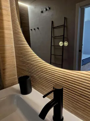a bathroom with a sink and a mirror at Illetes Flats - Suite cerca de Feria de Muestras y Metro in Valencia