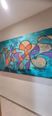 a painting hanging on a wall in a room at Apartment Nules in Nules