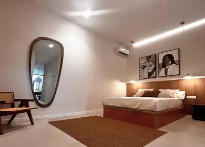 a bedroom with a bed and a large mirror at Pivote Flats-Puerto C in Valencia