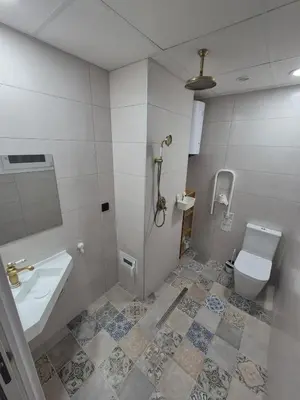 a bathroom with a toilet and a sink at Beach and City Valencia in Valencia