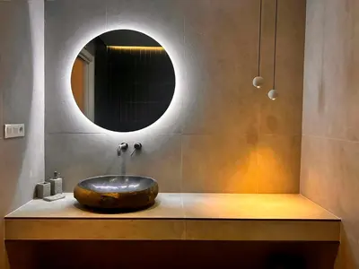 a bathroom with a stone sink and a mirror at Pivote Flats-Puerto B in Valencia