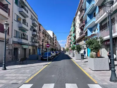 an empty street in a city with buildings at Estudio en Valencia in Valencia