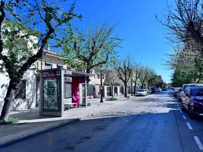 a bus stop on the side of a street at Estudio en Valencia in Valencia