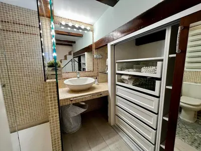 a bathroom with a sink and a toilet at La Casa de las CestaS in Valencia
