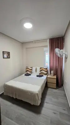 a bedroom with a large bed in a room at Apartamento Musical in Cullera