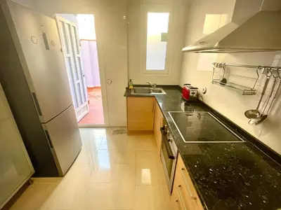 a kitchen with a sink and a counter top at luxury home vip valencia in Valencia