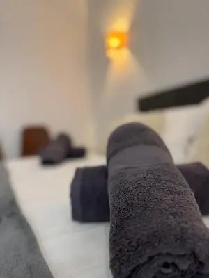 a close up of a blanket on a bed at Basset 2 in Valencia