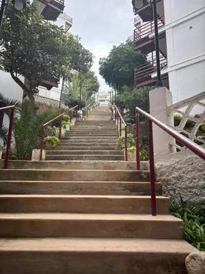 a set of stairs leading up to a building at Faro Cullera Sea view in Faro de Cullera