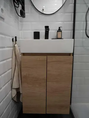 a bathroom with a white sink and a mirror at GuestReady – Luminous City Getaway in Valencia
