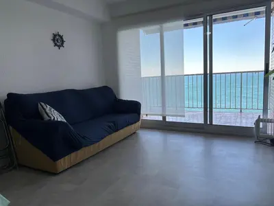 a view of the ocean from a balcony at Vista al mar con piscina in Faro de Cullera