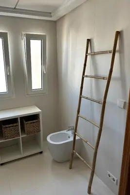 a bathroom with a ladder and a bath tub at Triplex 4 Bed Penthouse Sea Views Casa Privee - Lux Four bed Two bath Terraces & Balconies in Puerto de Sagunto
