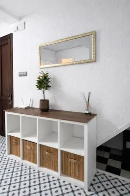 a bedroom with a bed and a table with flowers at Cullera Center, 15 min Beach in Cullera