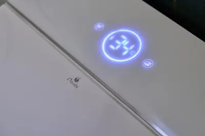 a close up of the back of a white smartphone at Romantic Apartment Botanico by Virkin Suites in Valencia