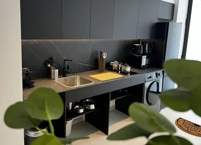 a small kitchen with a sink and a counter at BC22 - LoftValencia in Valencia
