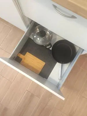 an overhead view of a counter with a pot and a bowl and a table at Central Cozy Ground Floor Studio in Valencia