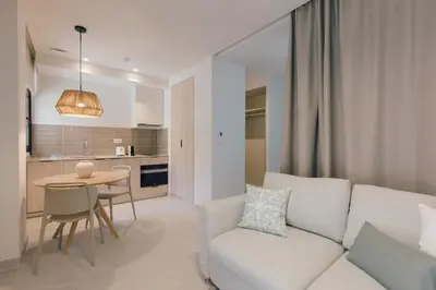 a living room with a couch and a table at GuestReady - Reental Apartments in Valencia
